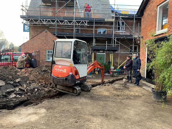 Hard at work digging the trench for the new kitchen electrics