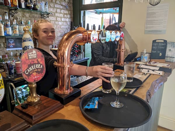 Serving behind the bar